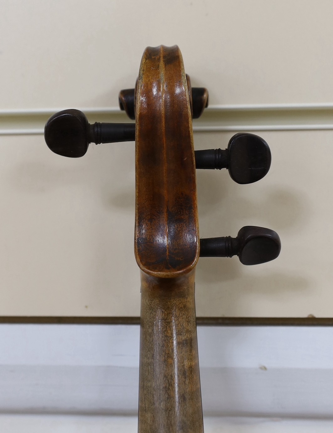 A cased German violin, 60cms long